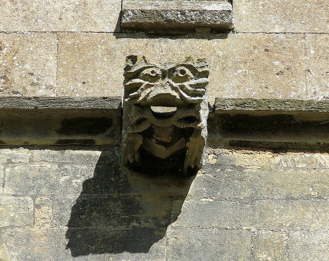 A gargoyle, the Church of St Denys, Aswarby, Lincolnshire, England. Photo by Spencer Means on Flickr (Creative Commons).