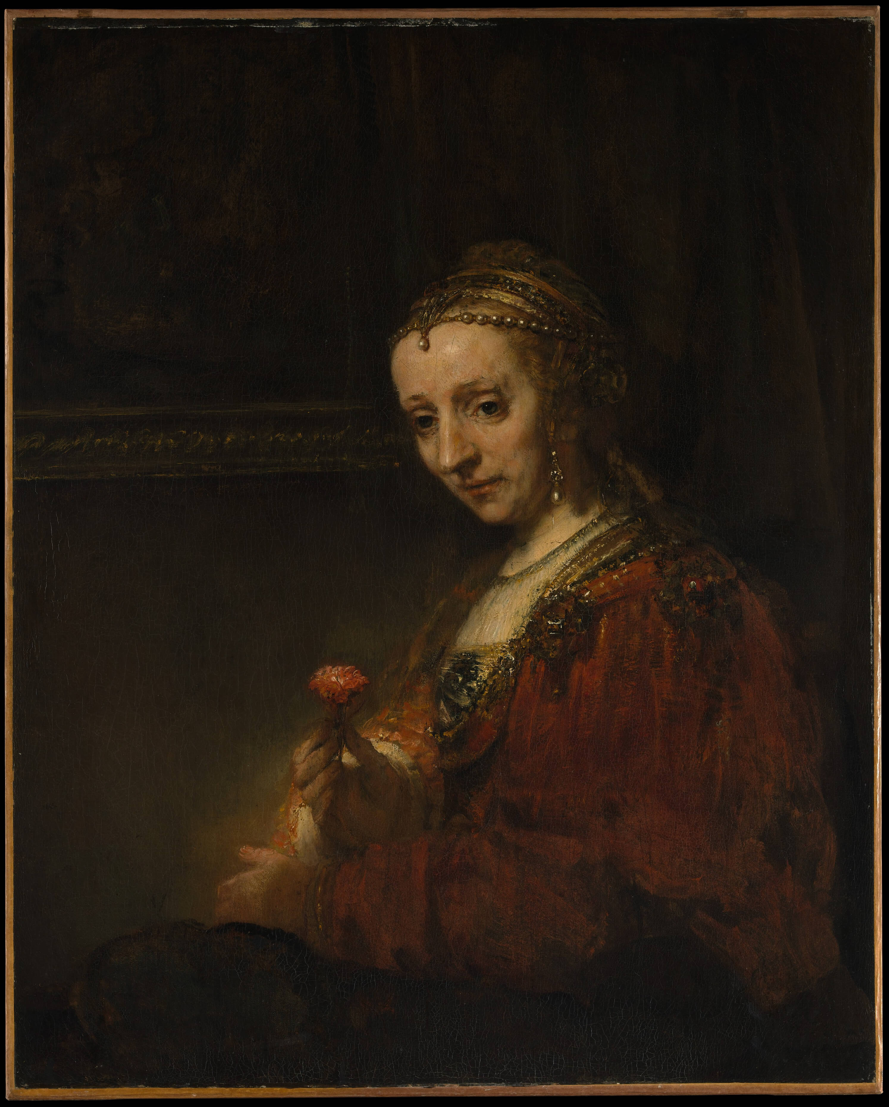 Woman with a Pink by Rembrandt Dutch Golden Age