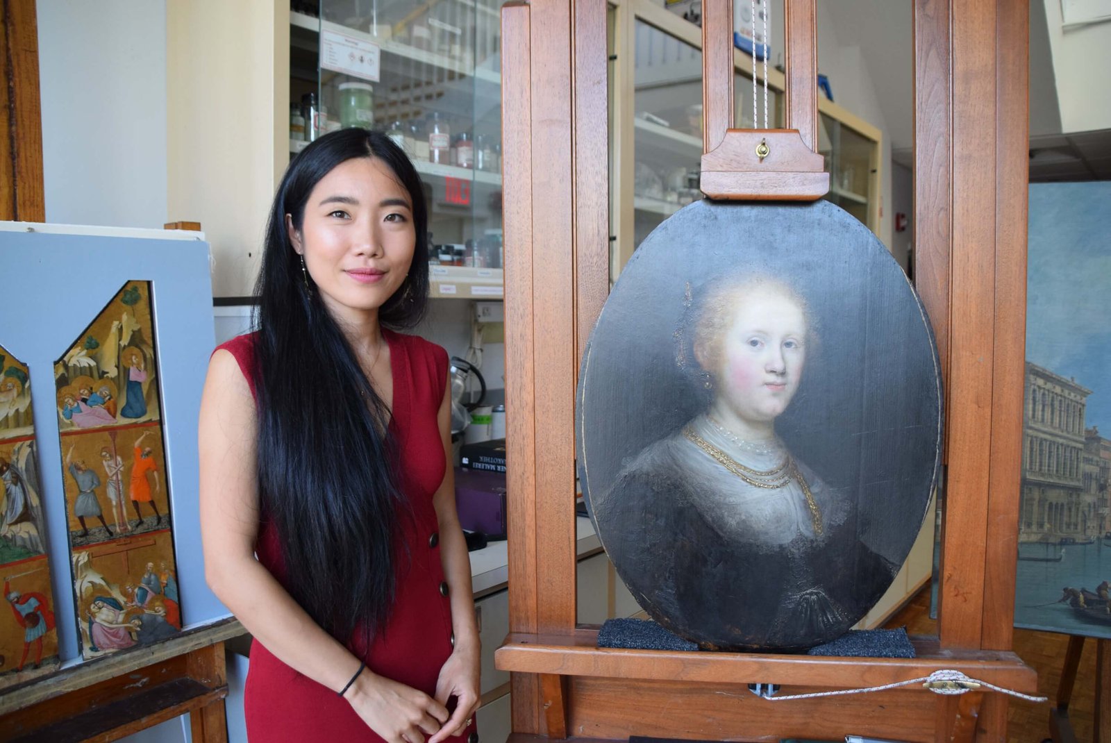 Conservator Shan Kuang with our Rembrandt in NYC