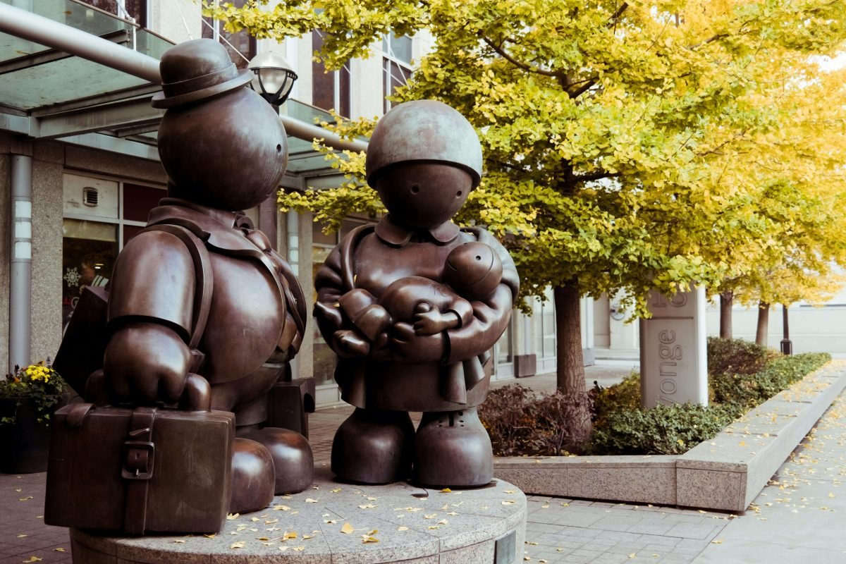 Modern Sculpture of a Family in the City