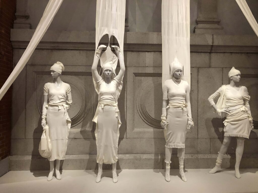 Four white costumes